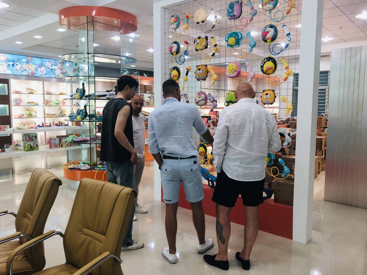 Buyers reviewing a toy range in a showroom